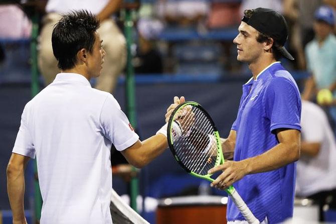 Japan's Kei Nishikori  (left) greets USA's Tommy Paul after his win at the Citi Open at Fitzgerald Tennis Center in Washington on Friday