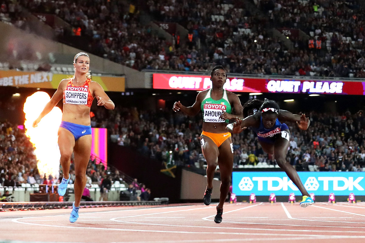 Tori Bowie of the United States trips as she crosses the finish line to win the Women's 100 Metres Final at the 16th IAAF World Athletics Championships at The London Stadium in London, United Kingdom, on Sunday