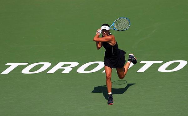 Spain's Garbine Mugaruza in action during her match against Kirsten Flipkens on Wednesday