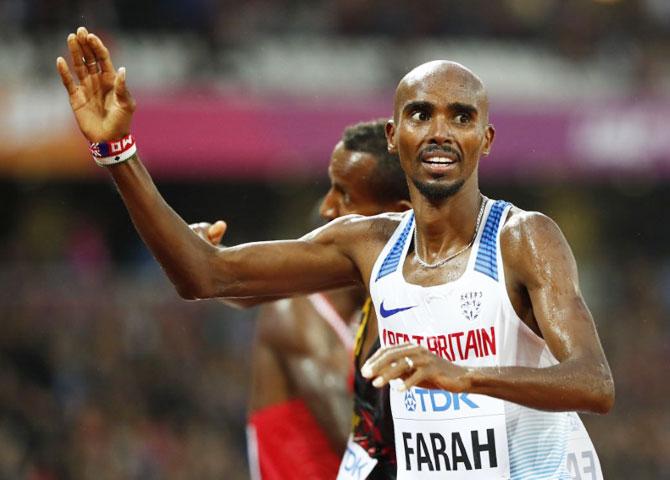 Mo Farah of Britain reacts