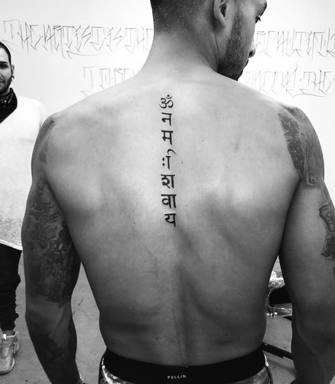 Theo Walcott gets Om Namah Shivaya tattooed on his back  India Today