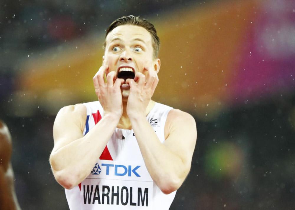 Norway'a Karsten Warholm reacts after winning the Men's 400 Metres Hurdles final at the World Athletics Championships at London Stadium, in London on Wednesday