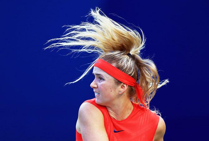 Ukraine's Elina Svitolina hits a shot against USA 's Venus Williams during the Rogers Cup match at Aviva Centre in Toronto on Thursday