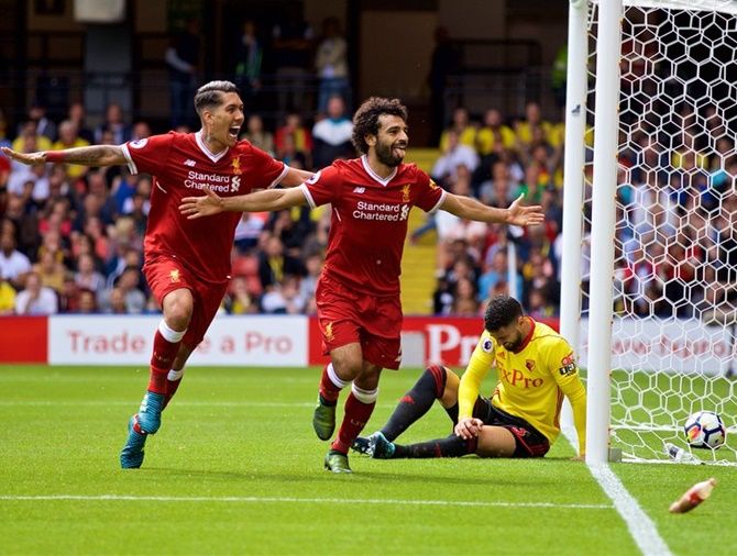 Liverpool’s new signing Mohamed Salah, right, made an impact in the club's 3-3 draw at Watford on Sunday