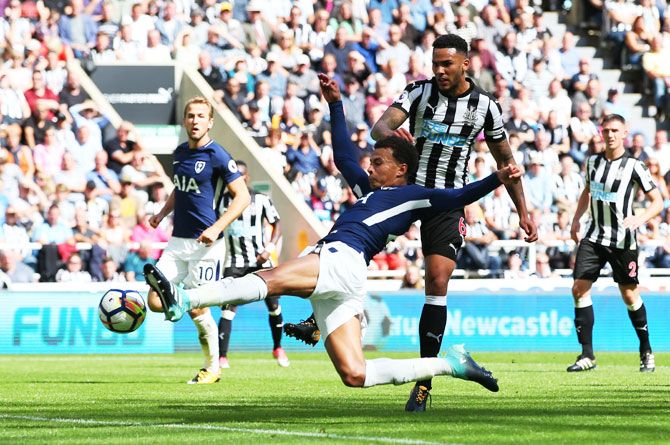 Tottenham Hotspur's Dele Alli scores his sides first goal against Newcastle United during their during the Premier League match at St. James's Park in Newcastle upon Tyne, on Sunday