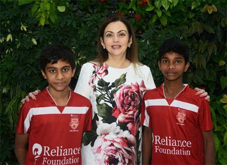 RF Young Champs Kshitij Kumar (left) and Balaji with Mrs. Nita Ambani before their trial at NEC