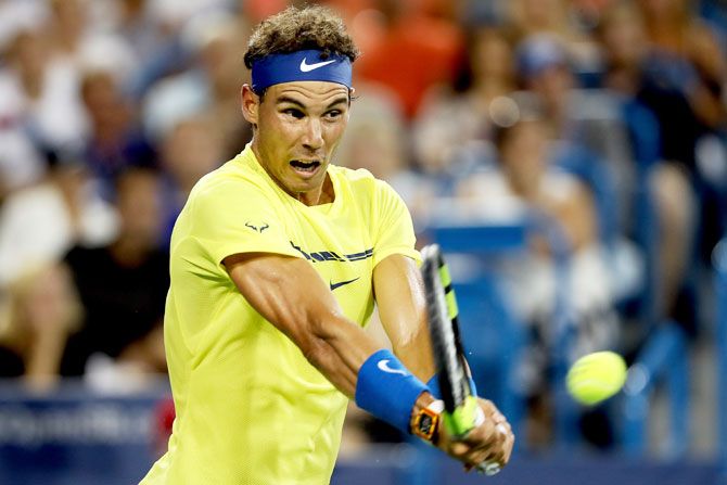 Spain's Rafael Nadal plays a return to France's Richard Gasquet during the Western & Southern Open at the Lindner Family Tennis Center in Mason, Ohio, on Wednesday
