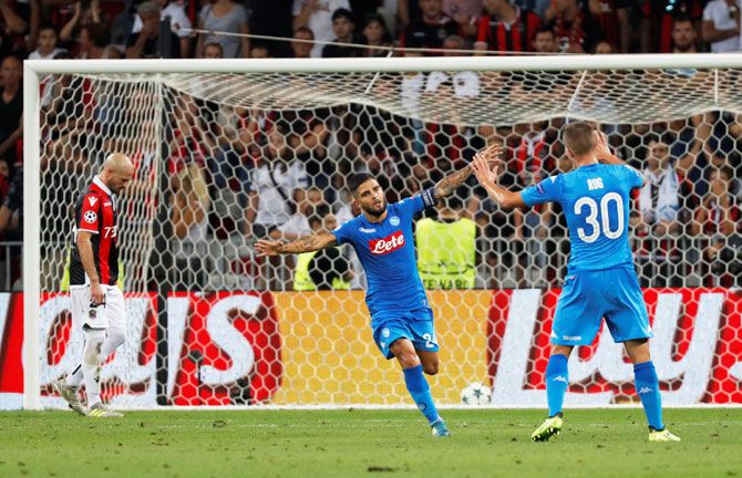 Napoli's Lorenzo Insigne celebrates scoring their second goal against Nice during the Champions League Playoffs in Nice on Tuesday