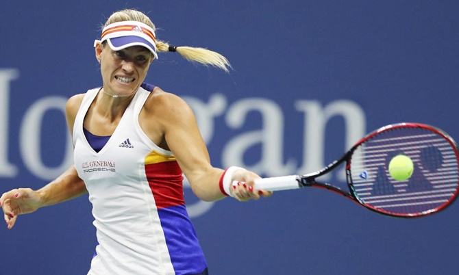 Defending champion Angelique Kerber revealed she was having trouble with her elbow during the US Open opening round loss to Japan's Naoi Osaka on Tuesday
