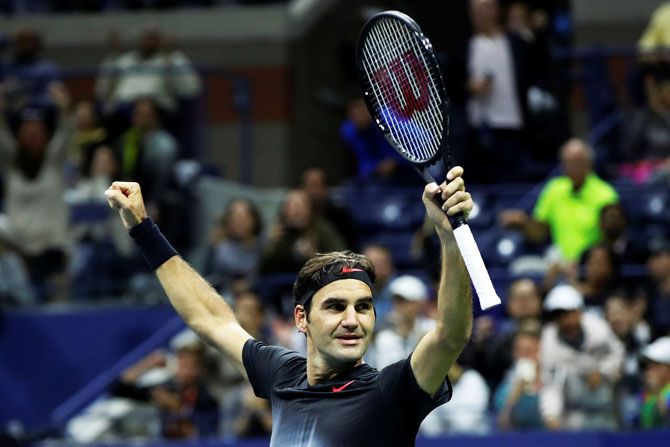 Roger Federer celebrates his first round win over USA's Frances Tiafoe on Day 2 of the US Open at Flushing Meadows in New York on Tuesday
