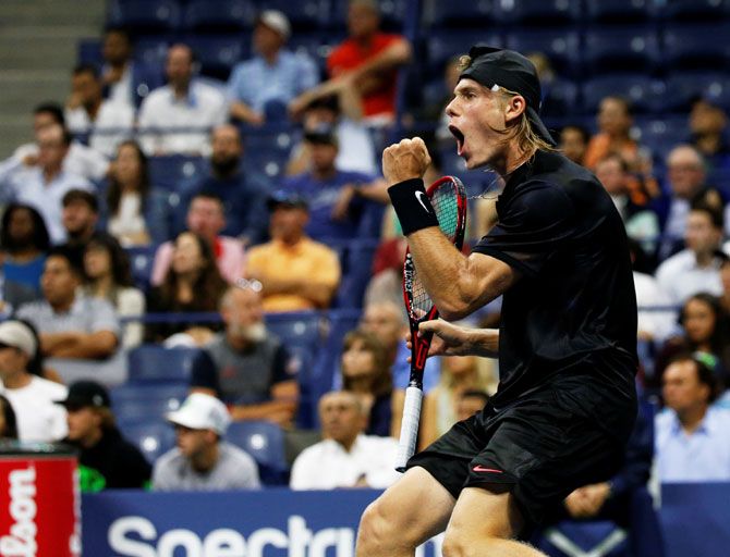 Canada's Denis Shapovalov celebrates during his second round match against Jo-Wilfried Tsonga