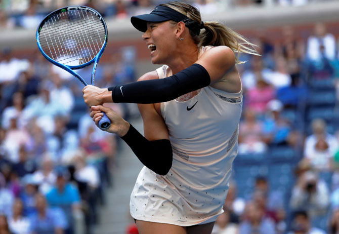 Maria Sharapova in action against Timea Babos in their second round match