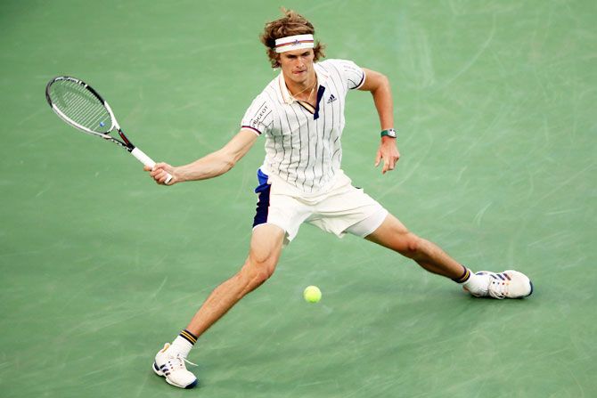 Germany's Alexander Zverev returns a shot against Croatia's Borna Coric during their second round at the USTA Billie Jean King National Tennis Center