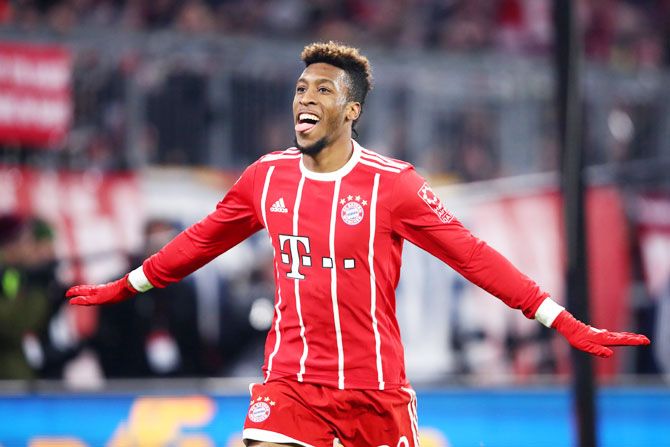 Bayern Munich's Kingsley Coman celebrates scoring their second goal against Hannover 96 at Allianz Arena, in Munich on Saturday