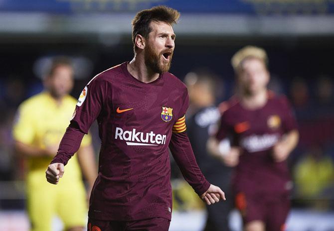 FC Barcelona's Lionel Messi celebrates on scoring the 2nd goal against Villareal on Sunday