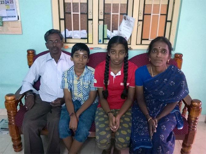  The two chess prodigies with their parents Nagalakshmi and Rameshbabu. Photograph: A Ganesh Nadar/Rediff.com