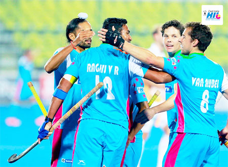 Players celebrate a goal