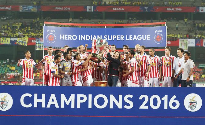 2016 ISL champions Atletico de Kolkata celebrate with ISL Chairperson Nita Ambani after defeating Chennaiyin FC on December 18