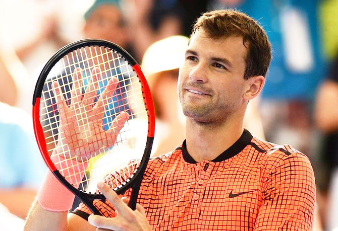 Bulgaria’s Grigor Dimitrov reacts after winning his match against Canada’s Milos Raonic at the Brisbane International semi-final at the Pat Rafter Arena in Brisbane on Saturday