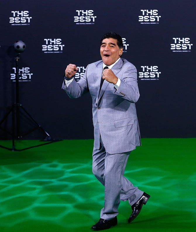 Diego Maradona, one of the greatest footballers of all time, clowns around before the ceremony. Photograph: Arnd Wiegmann/Reuters