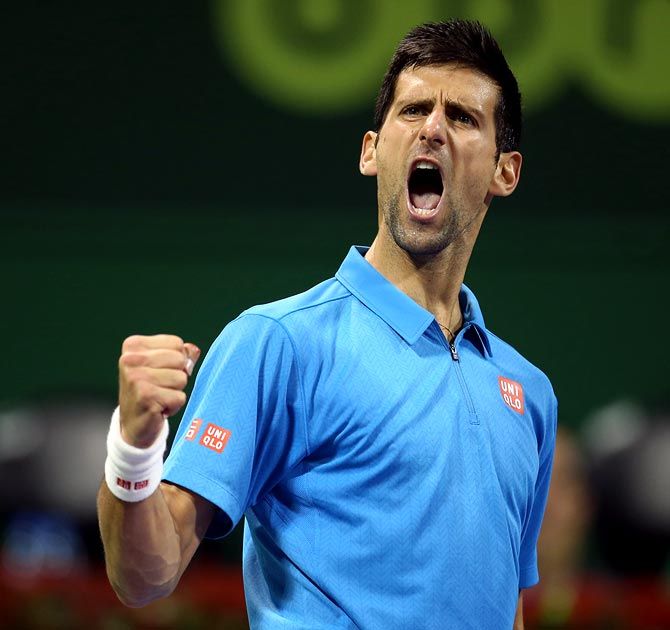 Novak Djokovic reacts after winning a point