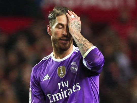 Real Madrid's Sergio Ramos reacts during the La Liga match against Sevilla at the Ramon Sanchez Pizjuan stadium in Seville, Spain, on Sunday