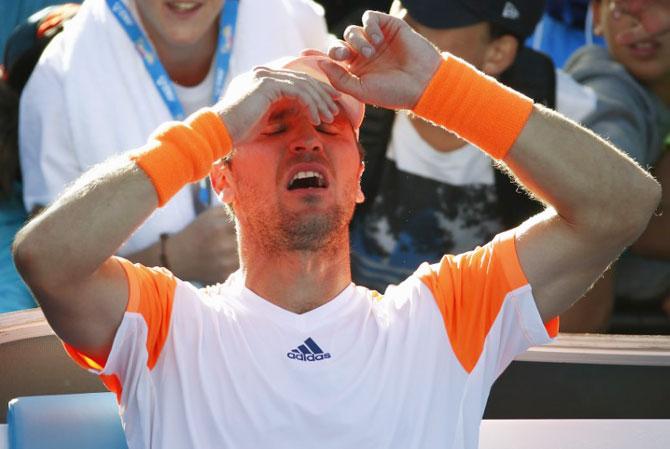 Germany's Mischa Zverev reacts after winning his Men's singles second round match against John Isner of the U.S. on Wednesday