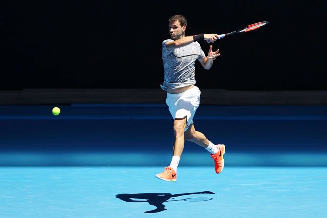 Bulgaria's Grigor Dimitrov plays a forehand in his second round match against Korea's Hyeon Chung on Thursday