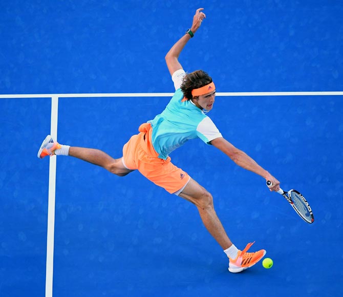 PHOTOS: Nadal survives Zverev challenge to enter last 16 - Rediff Sports