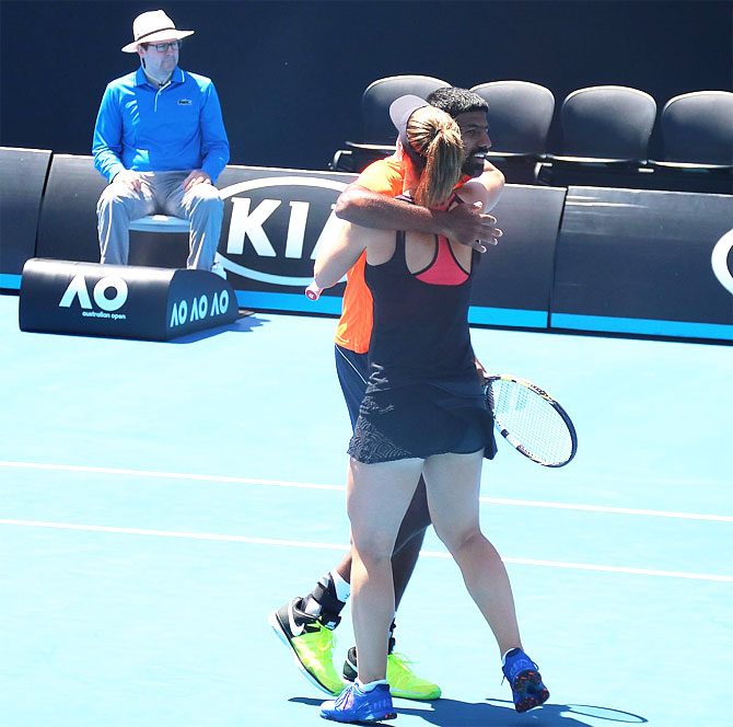 Rohan Bopanna celebrates with his Canadian partner Gabriela Dabrowski after booking a berth in the Australian Open mixed doubles quarter-finals on Tuesday