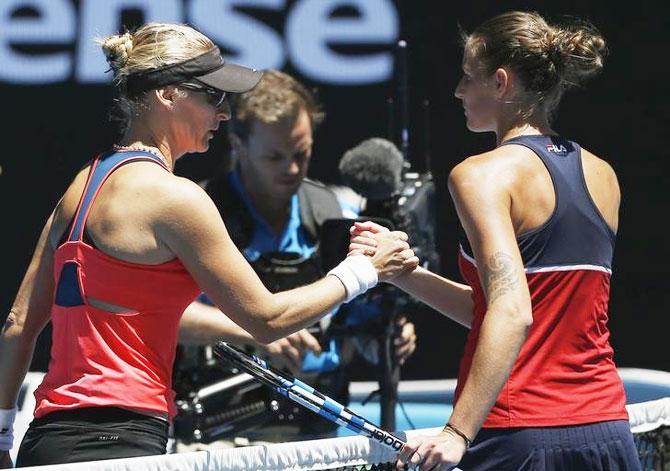 Croatia's Mirjana Lucic-Baroni is congratulated by Czech Republic's Karolina Pliskova at the net