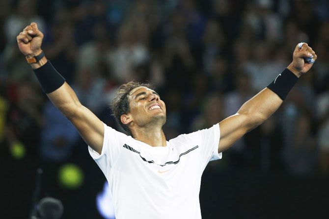 Spain's Rafael Nadal celebrates winning his Australian Open quarter-final against Canada's Milos Raonic at Melbourne Park on Wednesday