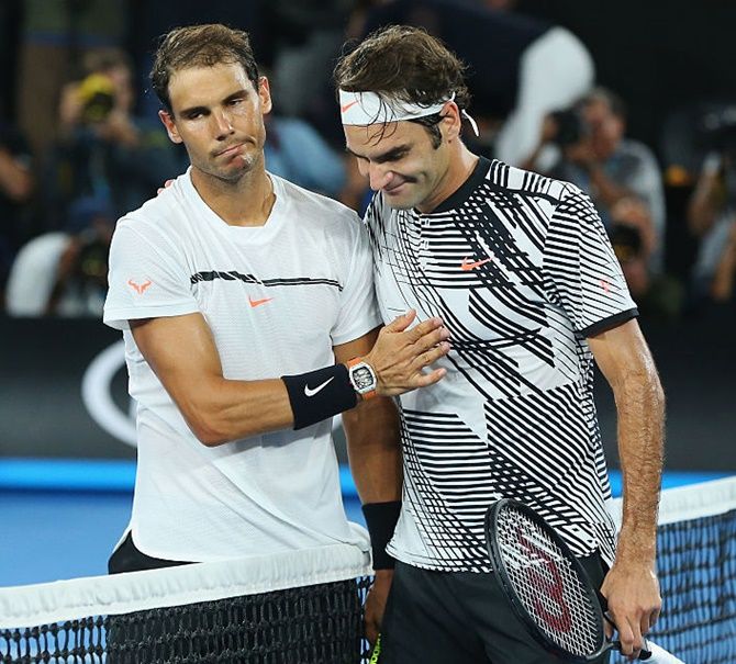 Rafael Nadal and Roger Federer. Photograph: Michael Dodge/Getty Images