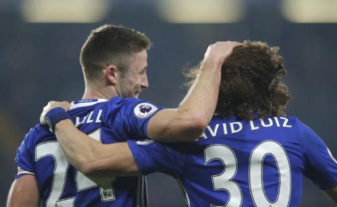 Chelsea's Gary Cahill and David Luiz celebrate after the match