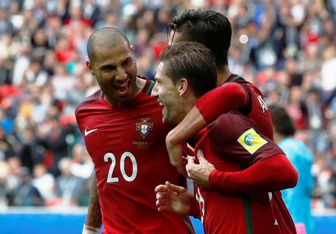 Portugal’s Adrien Silva celebrates scoring their second goal with teammates during their Confederations Cup third place match against Mexico at Spartak Stadium in Moscow on Sunday