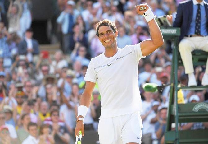 Spain’s Rafael Nadal celebrates winning his first round match against Australia’s John Millman