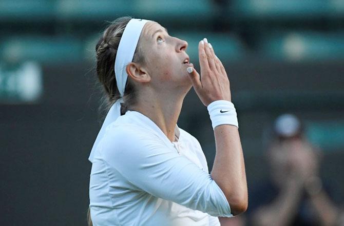 Belarus’ Victoria Azarenka celebrates winning her first round match against USA’s Catherine Bellis