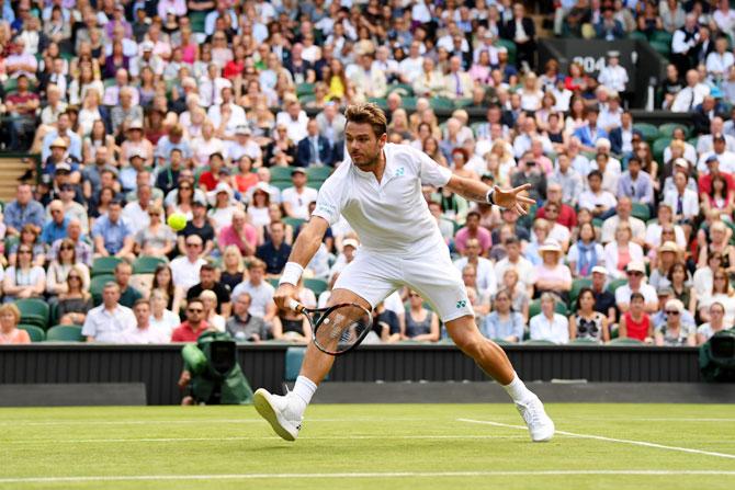 Switzerland's Stan Wawrinka plays a backhand during his first round match against Russia's Daniil Medvedev