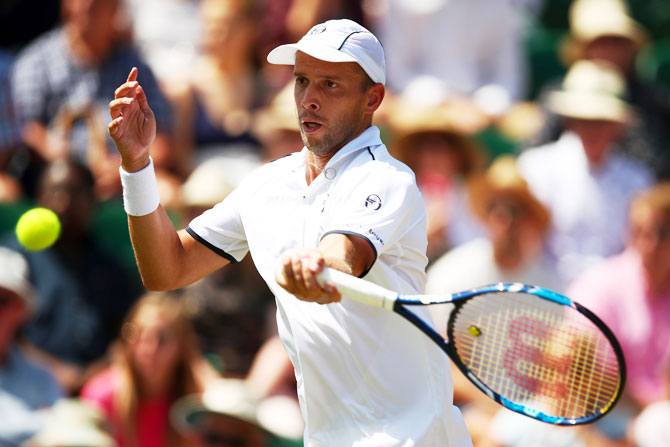 Gilles Muller of Luxembourg plays a forehand shot