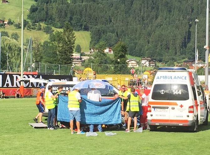 Ajax Amsterdam midfielder Abdelhak Nouri recieves medical attention after collapsing on the field during a pre-season friendly against Werder Bremen in Austria on Saturday