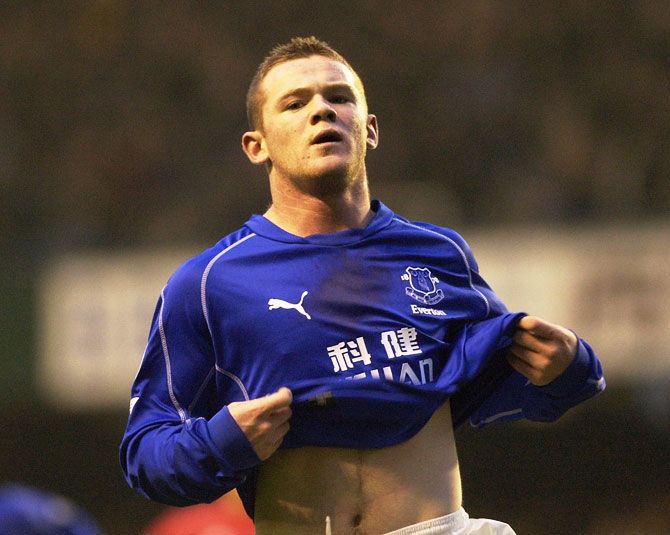 Wayne Rooney celebrates on scoring a goal for Everton in 2002