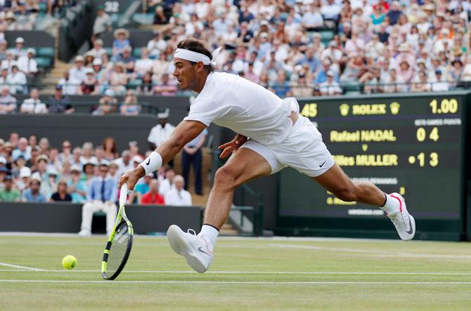 Rafael Nadal in action during his fourth round match against Gilles Muller