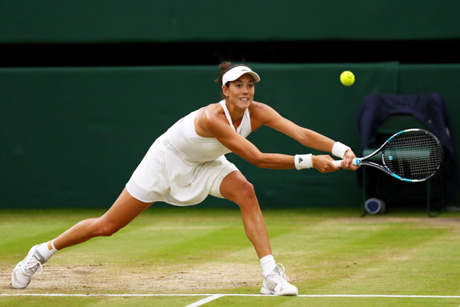 Garbine Muguruza plays a backhand