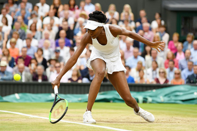 Venus Williams plays a backhand shot