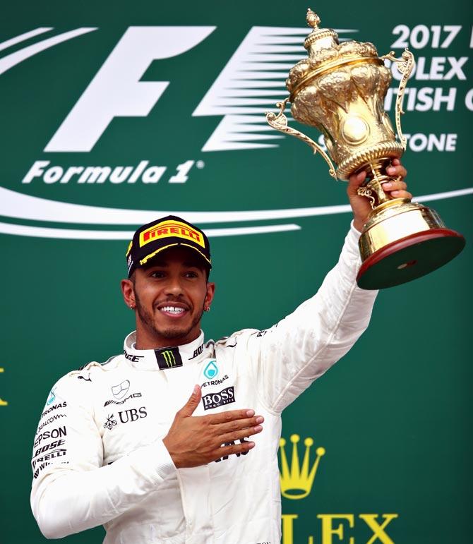 Hamilton wins British Grand Prix to slash Vettel's lead - Rediff Sports