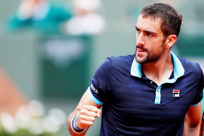 Croatia's Marin Cilic celebrates during his third round match against Spain's Feliciano Lopez