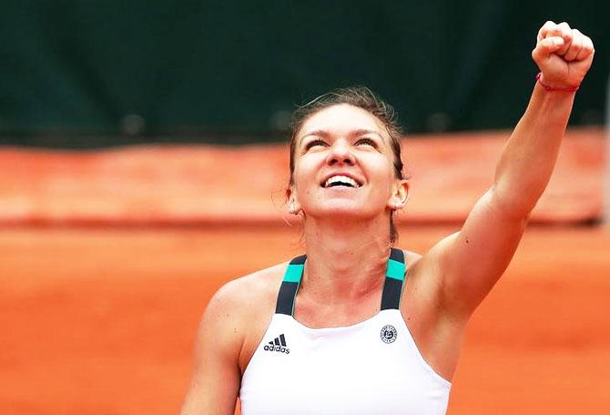 Romania's Simona Halep celebrates winning her third round win over Russia's Daria Kasatkina