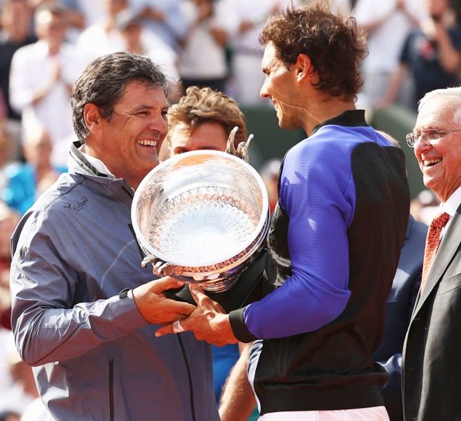 Rafael Nadal with coach and uncle Toni Nadal after winning his 10 French Open title in June this year