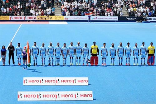 The Indian hockey team at the national anthem before their match against Pakistan on Sunday