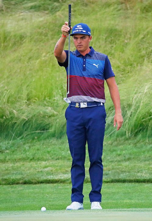 Rickie Fowler of the United States lines up a putt on the 17th green during the third round of the 2017 US Open at Erin Hills in Hartford, Wisconsin, on Saturday